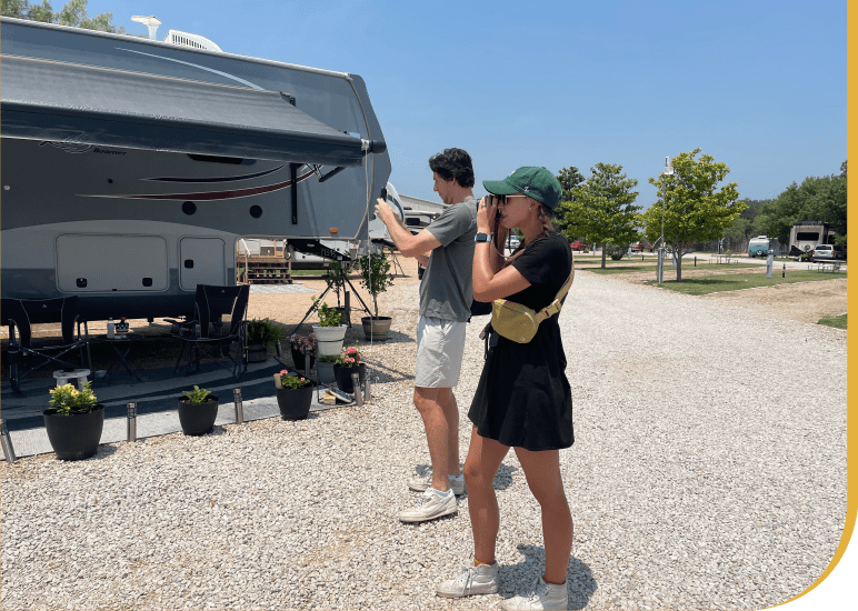 Marketing Interns Capturing Photos, Working on a Practical Project Outdoors