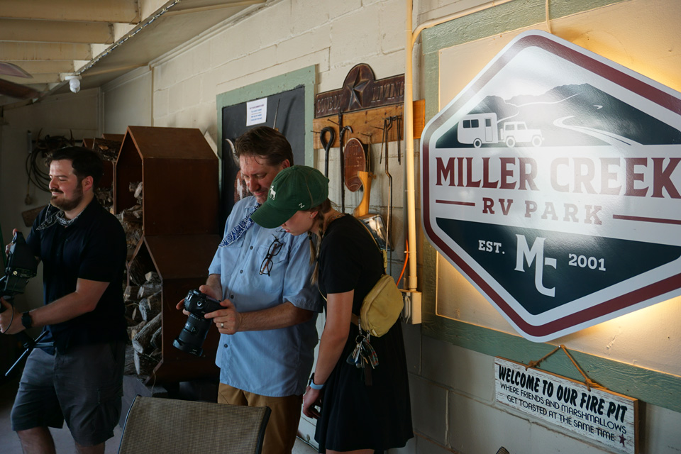 NLT marketing agency photography team setting up equipment at Miller Creek RV Park