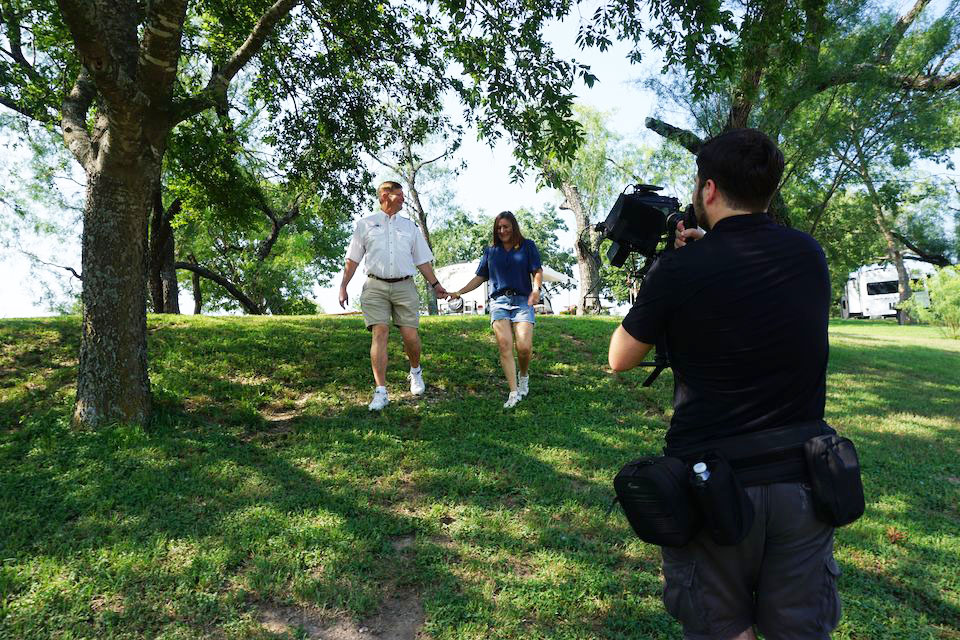 Videographer filming at Miller Creek RV Park during a brand relaunch to highlight its scenic and welcoming atmosphere