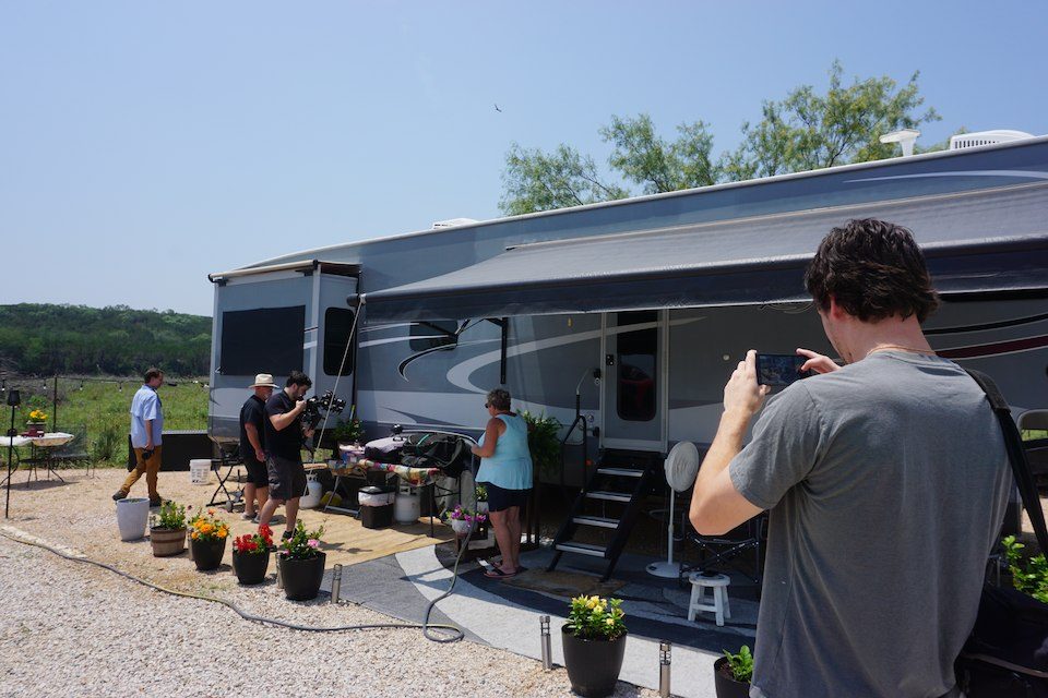 NLT marketing strategy team during an outdoor video shoot session