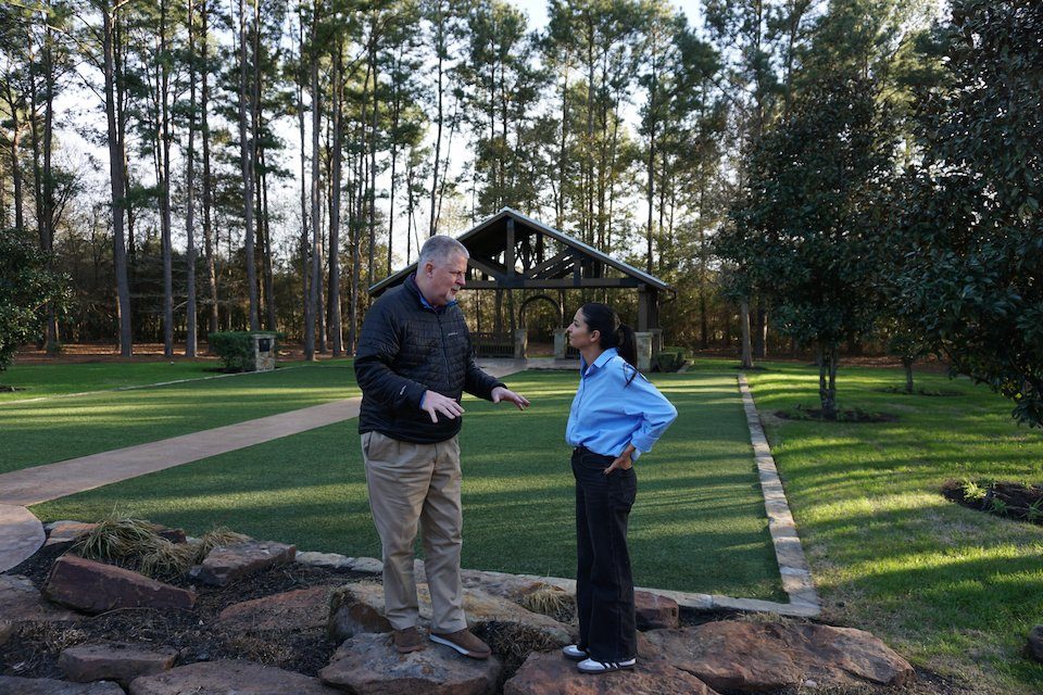 Marketing professionals from NLT discussing brand strategy consulting in an outdoor setting